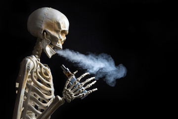 Skeleton vaping clouds of vapor with an ecigarette
