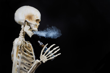 Skeleton vaping clouds of vapor with an ecigarette