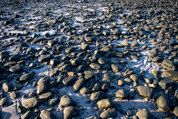 Stone and pebbles on beach