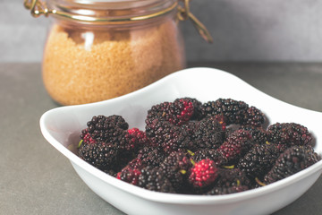 Healthy breakfast with waffle, blackberries, milk, honey and cereals. Morning concept..