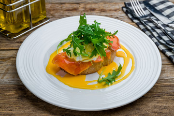 eggs Benedict with salmon and avocado