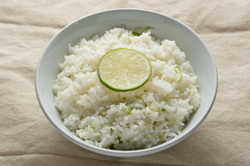 Cilantro lime in white dish,lemon on rice