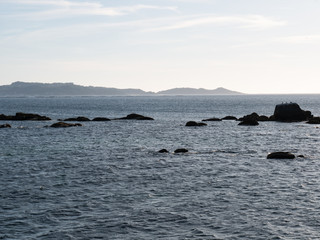 Obraz premium view of beach with rocks