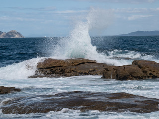 waves breaking against the stones in the Cantabrian Sea