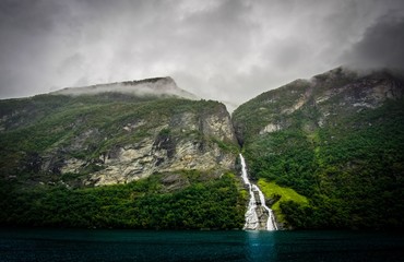 waterfall in crevasse in Norwegian fjord