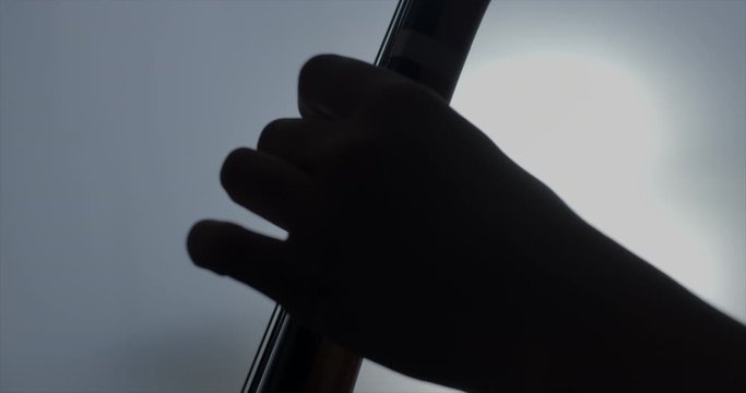 Cello musician fingers playing music silhouette