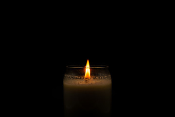 Lit Candle on Black