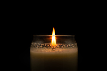 Lit Candle on Black