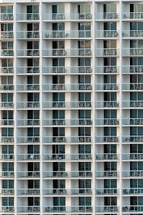 Fototapeta na wymiar Glass facade with balconies, modern building, no people