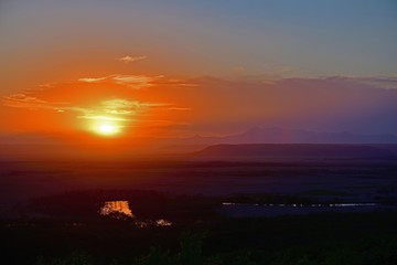 Fototapeta na wymiar 釧路湿原に沈む夕日の情景＠北海道