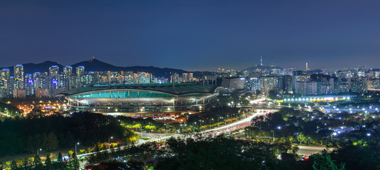 Fototapeta na wymiar andscape of seoul city at night and World Cup Stadium in Seoul view from Haneul park Photo taken on october 15 2017 in Seoul South Korea.