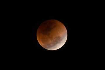 Lunar eclipse and night sky