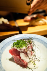 sashimi seafood on plate at restaurant