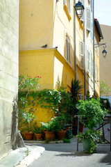 facade of mediterranean building with colorful shutter	