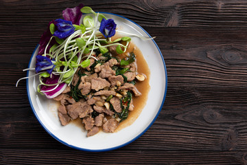 Stir-fried spicy beef with basil