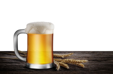 Glass of Light Beer with wheat on the wooden table isolate white background, with copy space for your text