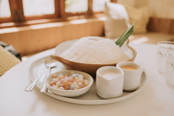 Thai desserts are on the table in the restaurant.