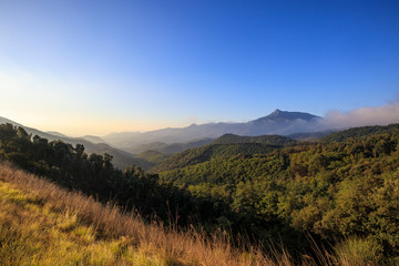 Obraz premium Cloudscape sunrise in Catalan Pyrenees over green mountains