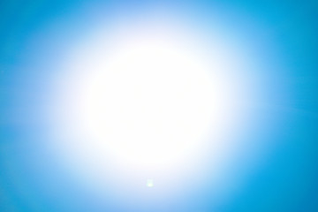 Blue light flare special effect  on black background , concert lighting .