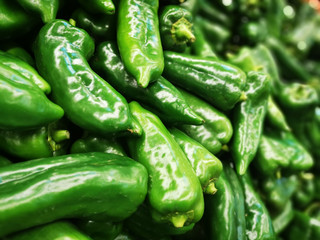 Green pepper in a harvest background. close up shot