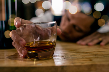 glass of whiskey in bar