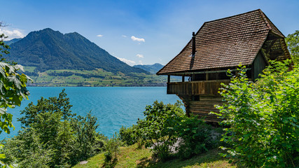 Fototapeta na wymiar Scenic panorama view on old house on the lake Lucern