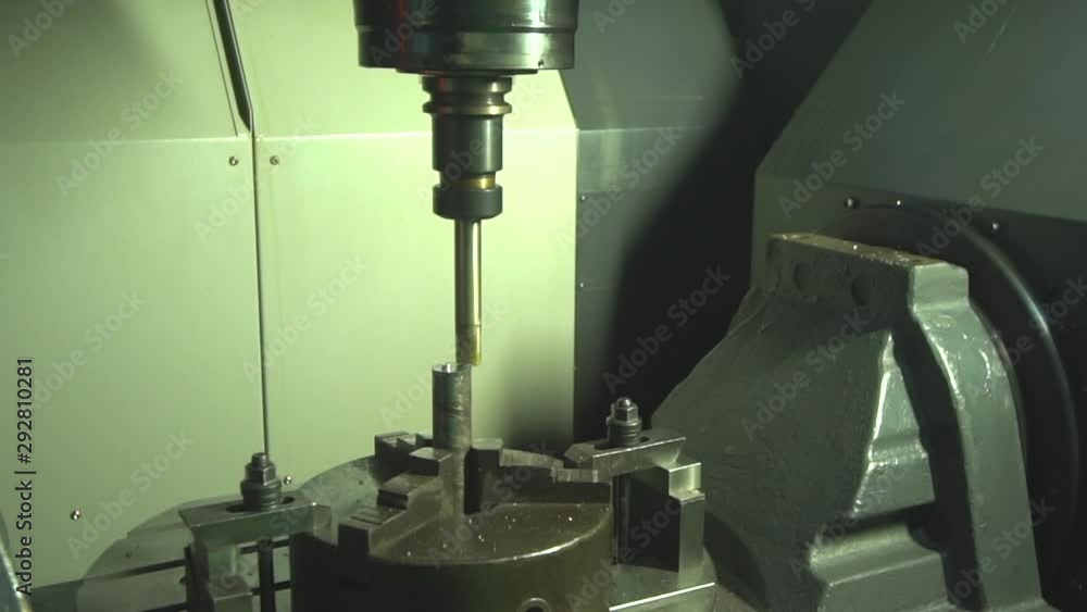 Poster tracking shot of an automated cnc machine doing precise cutting work in a factory (kilang di malaysi
