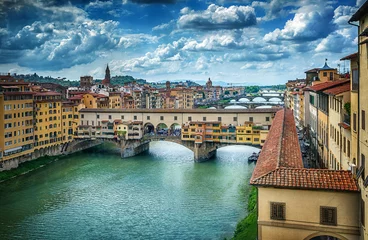 Wall murals Famous bridge Ponte Vecchio on the river Arno in Florence, Italy.