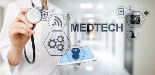 Medtech medical technology information integration internet big data concept on virtual screen....