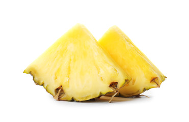 Slices of tasty juicy pineapple on white background