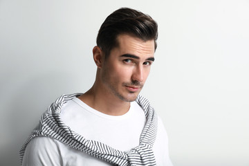 Obraz premium Portrait of handsome young man on white background