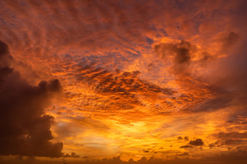 Amazing colorful bright tropical sunset in Bali island. Red colored clouds.