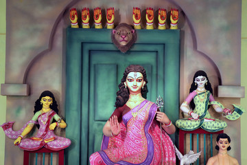 A close up view of a Durga idol. According to the Indian Mythology a decorated clay Sculptures of...
