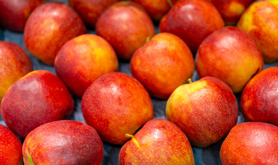 Ripe red apples. Harvest of autumn in the store.