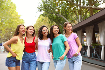 Happy women outdoors on sunny day. Girl power concept