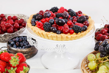 Sweet tart with raspberries, blueberries, blackberries, cherries and red currants.