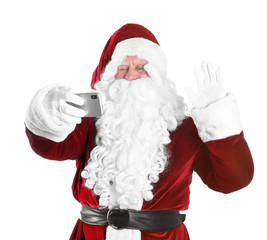 Authentic Santa Claus taking selfie on white background