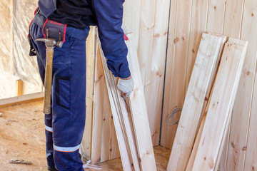 The interior of the wooden house. Construction of wooden houses.