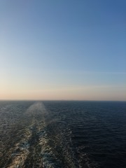 Sunset at Sea with Horizon and blue Water