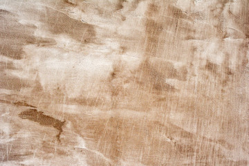 Texture of a concrete wall with cracks and scratches which can be used as a background
