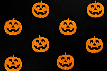 Halloween party. Scary orange pumpkin decoration isolated on bla