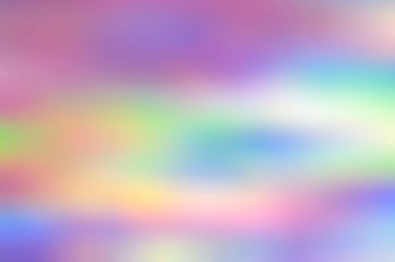 Soft pastel iridescent holographic abstract background. Trendy phone wallpaper or a screen saver
