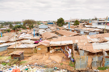 Kibera is the biggest slum in Africa. Slums in Nairobi, Kenya. - obrazy, fototapety, plakaty