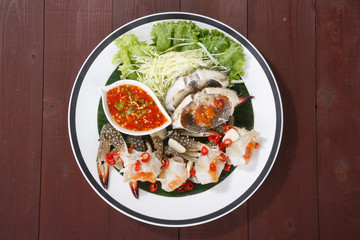 Fish sauce-fermented Horse crab on Plate. Fish sauce-fermented blue crab on Plate.  Thai Street Food.