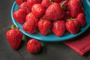 close up image of strawberries on a plate as part of macro photography