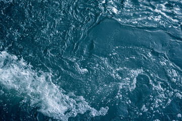 Blue and turquoise water with irregular wave structure