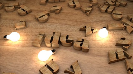 Idea word from wooden cubes, wood letters text string on table with light bulbs