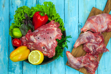nutria meat with vegetables and herbs, blank, meat processing.