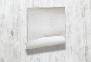 paper on wooden background
