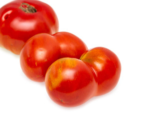 ripe red tomato on a white background